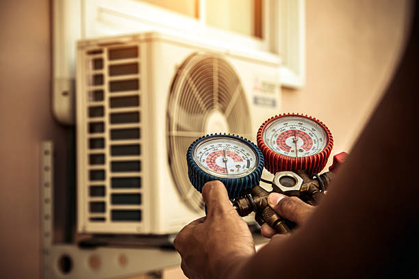 Professional Heat Pump Repair technician working in Saint Leo, FL